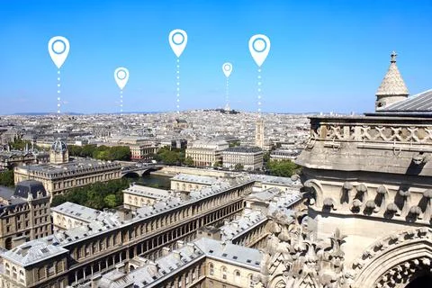 Network connection concept. Overlooking Paris and white location pins. Global Stockfoto's