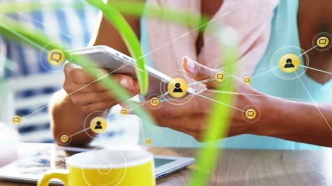 Network of connection icons against mid section of woman using smartphone Stock Footage 139807281