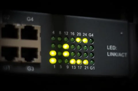 Network connection technology with network switch router, status LED showing Stock Photos