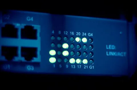 Network connection technology with network switch router, status LED showing Stock Photos