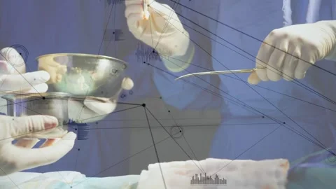 Network of connections against mid section of surgeons performing operation in Stock Footage 328600872