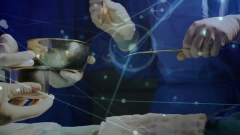 Network of connections against mid section of surgeons performing operation in Stock Footage 330341641