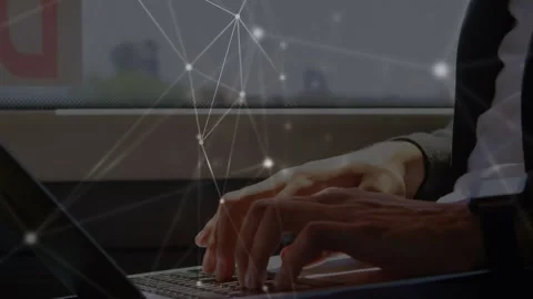 Network of connections over mid section of businessman using a laptop in a train Stock Footage 330478439