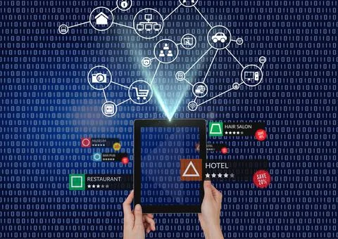 Network of digital icons over hand holding digital tablet against binary coding 스톡 사진