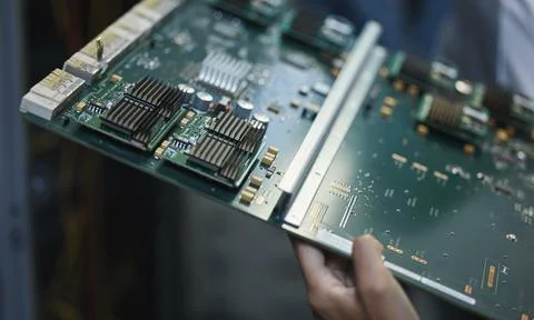 Network engineer, motherboard and server room for internet infrastructure and Stock Photos