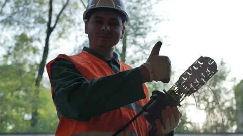A network engineer in a server room with an optical cable. Stock Footage 89237656