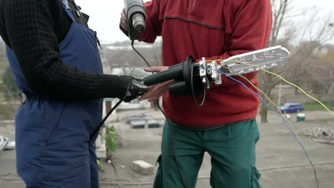 Network engineer in server room works with optical patchcord and optical module. Stock Footage 126988252