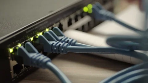 Network engineer working on Ethernet cable switch Stock Footage 111659312