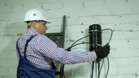 A network engineer works with optical fiber equipment Stock Footage 150092867