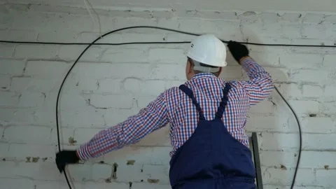 A network engineer works with optical fiber equipment Stock Footage 150171195