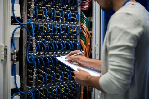 Network Engineer Writing Data 스톡 사진