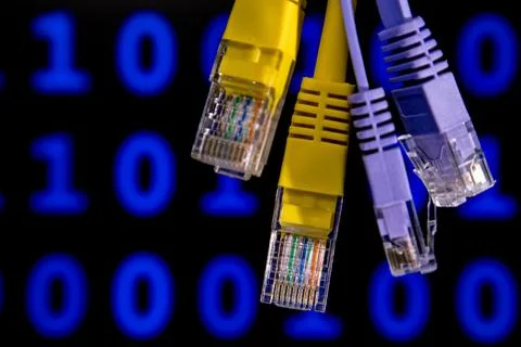 Network ethernet cables with binary code background Stock Photos