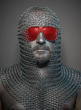 Network firewall, man with iron armor and red glasses, concept of protection  Stockfoto's