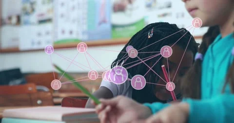 Network graphic appearing, student reaching pink nodes then writing worksheet to Stock Footage 333963163