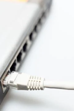 Network hub switch with lan cable connected Stock Photos
