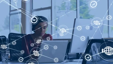 Network icon appearing, globe and chart nodes spreading and linking across desk Stock Footage 334114467