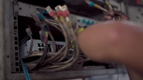 Network Infrastructure engineer remove network switch from rack Stock Footage 171931350