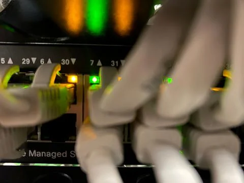 Network lights and cables in data center close-p view Stock Photos