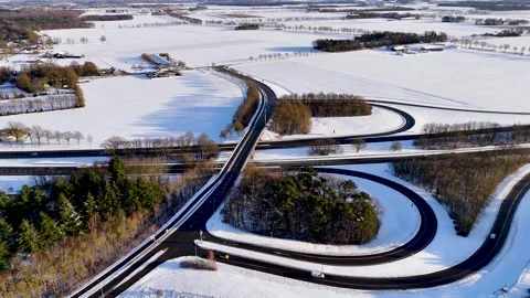Network Of Looping Ramps Paints Complex Patterns Across Snowcovered Rural Stock Footage 327051190