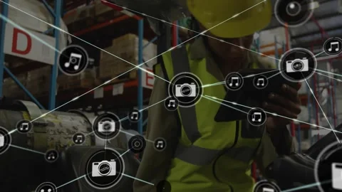 Network of multimedia icons and connections animation over warehouse worker Stock Footage 330659823
