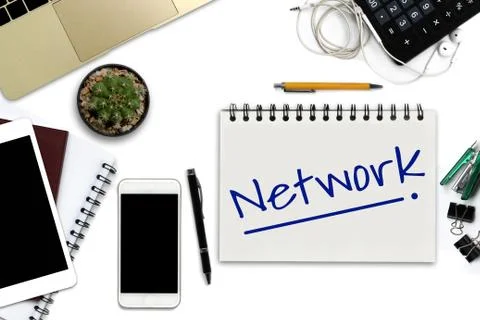 Network on notepad - White office desk with smartphone with black screen, pen Foto stock