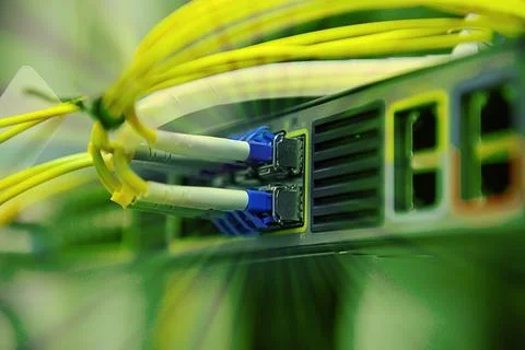Network optical fiber cables and hub Stock Photos