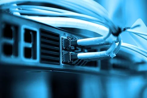 Network optical fiber cables and hub Stock Photos