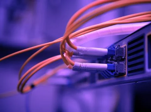 Network optical fiber cables and hub Stock Photos