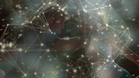 Network overlay drifting and fading revealing pair doing fitness balance nodes Stock Footage 333553126