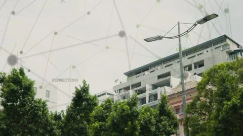 Network overlay fading in over midrise and lamp post, nodes drifting labels Stock Footage 333894247