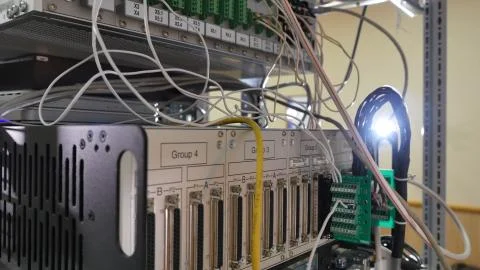 Network panel, switch and cable in data center Stock Photos