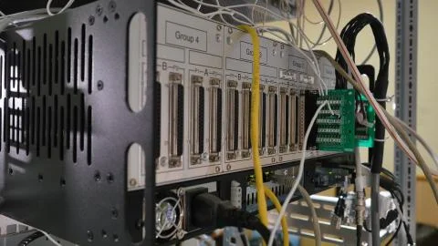 Network panel, switch and cable in data center Stock Photos