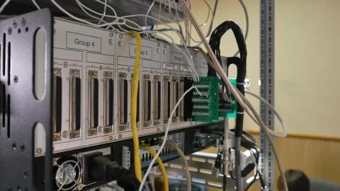 Network panel, switch and cable in data center Stock Photos