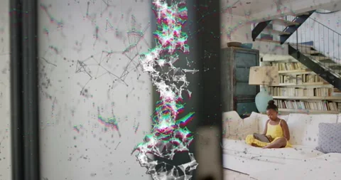 Network pattern pulsing at center driving girl tapping tablet in living room Stock Footage 318917742