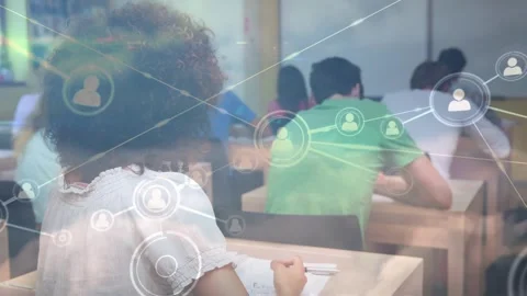 Network of profile icons against diverse group of students studying in the class Stock Footage 327059881