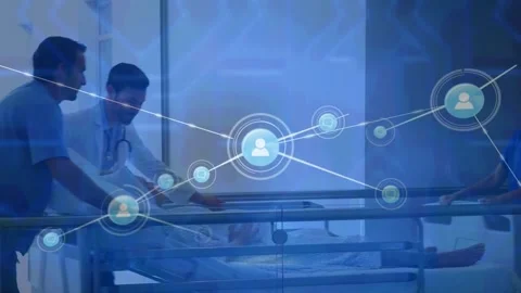 Network of profile icons against group of health workers rushing a patient to Stock Footage 330255320