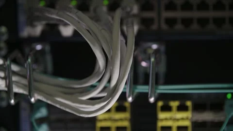 Network server cables and switches in a dark data center, selective focus, Stock Footage 266416015