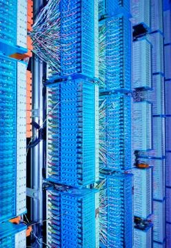Network server room routers and fiber optical cables Stock Photos