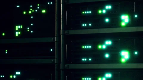 Network servers light up in data center during busy hours Stock Footage 345007414