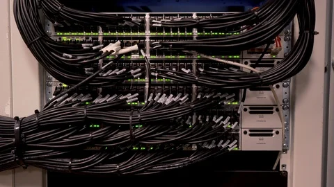 Network Switch and Ethernet Cables Patched into Local Network and IPTV Stock Footage 102865363