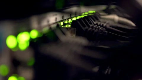 Network Switch and Ethernet Cables Patched into Local Network and IPTV Stock Footage 102865839