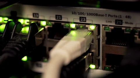 Network Switch and Ethernet Cables Patched into Local Network and IPTV Stock Footage 102866232