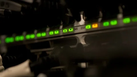 Network Switch and Ethernet Cables Patched into Local Network and IPTV Stock Footage 102867739