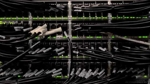 Network Switch and Ethernet Cables Patched into Local Network and IPTV Stock Footage 102869807