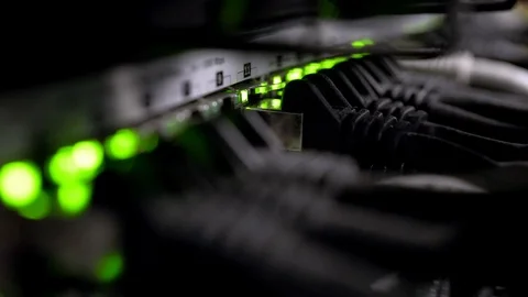 Network Switch and Ethernet Cables Patched into Local Network and IPTV Stock Footage 102870663