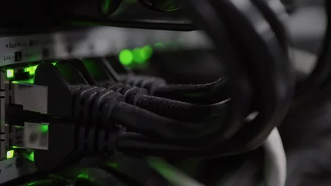Network Switch and Ethernet Cables Patched into Local Network and IPTV Stock Footage 102871112