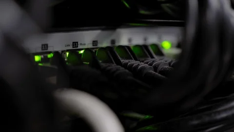 Network Switch and Ethernet Cables Patched into Local Network and IPTV Stock Footage 102872938