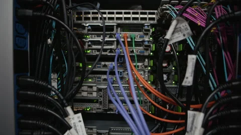 Network Switch and Ethernet Cables Connected in Data Center Server Rack Stock Footage 330540355