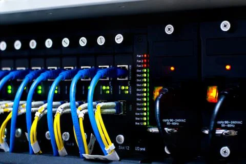 Network switch and ethernet cables Stock Photos