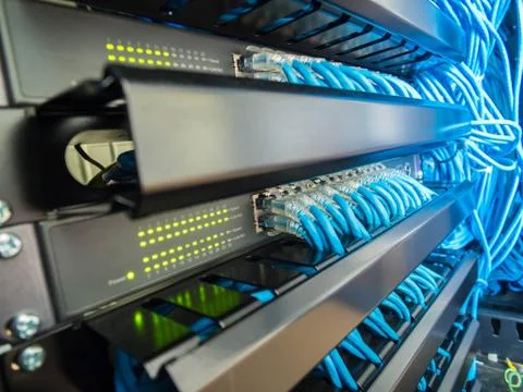 Network switch and ethernet cables Stock Photos